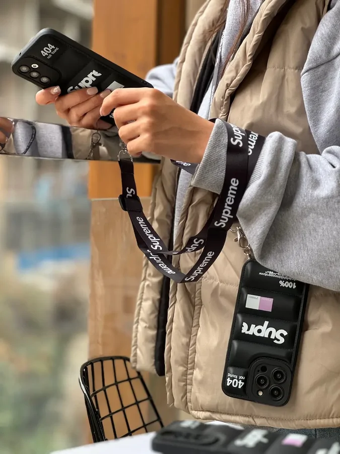 1081e0 قاب پافر Supreme با بند آیفون ، سامسونگ ، شیائومی (کدC1517) - تصویر 1